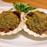 Capesante gratinate con funghi champignon